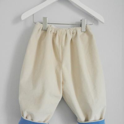Pantalon en velours milleraies écru doublé de coton bleu - 12 mois